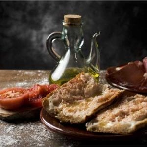 Glass bread - pa de vidre from Spain with tomato and olive oil